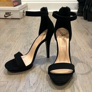 Window store black suede sandals
